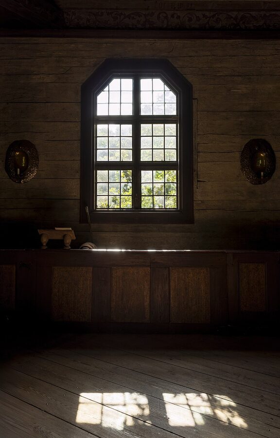 Seglora Church interior at Skansen with painted wooden ceiling