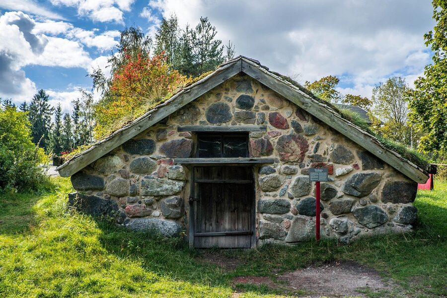 Skansen traditional Swedish hut in park with timber walls