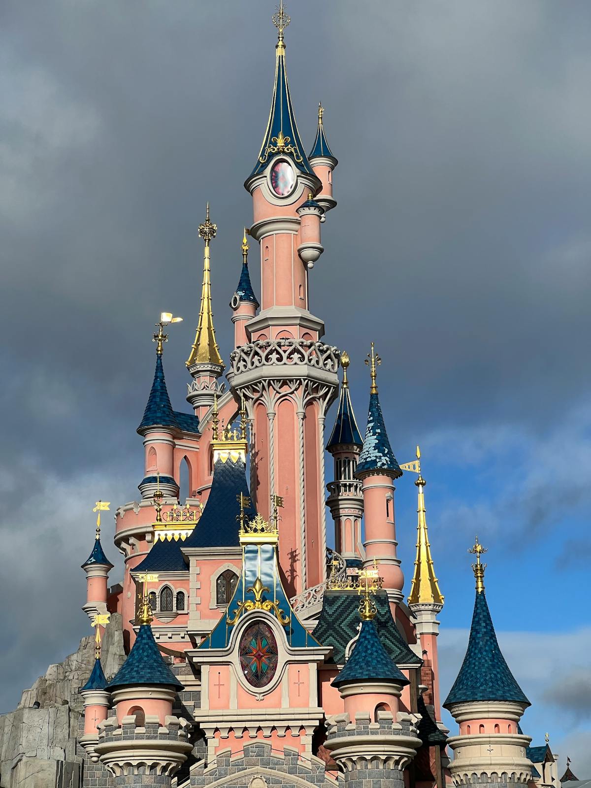 The iconic Sleeping Beauty Castle at Disneyland Paris with detailed Gothic architecture