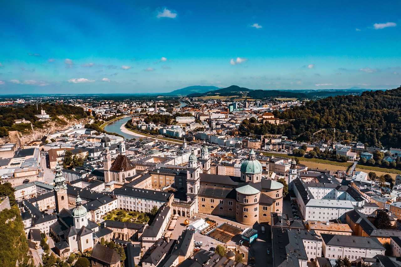 Salzach River flowing through Salzburg with Hohensalzburg Fortress on the hilltop