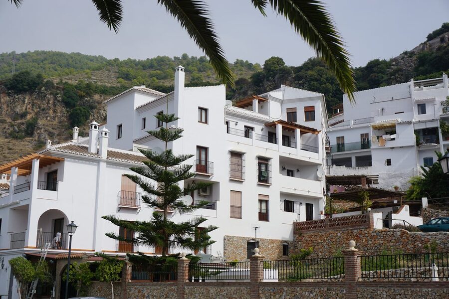 White townhouses in a Mediterranean Spanish hillside area