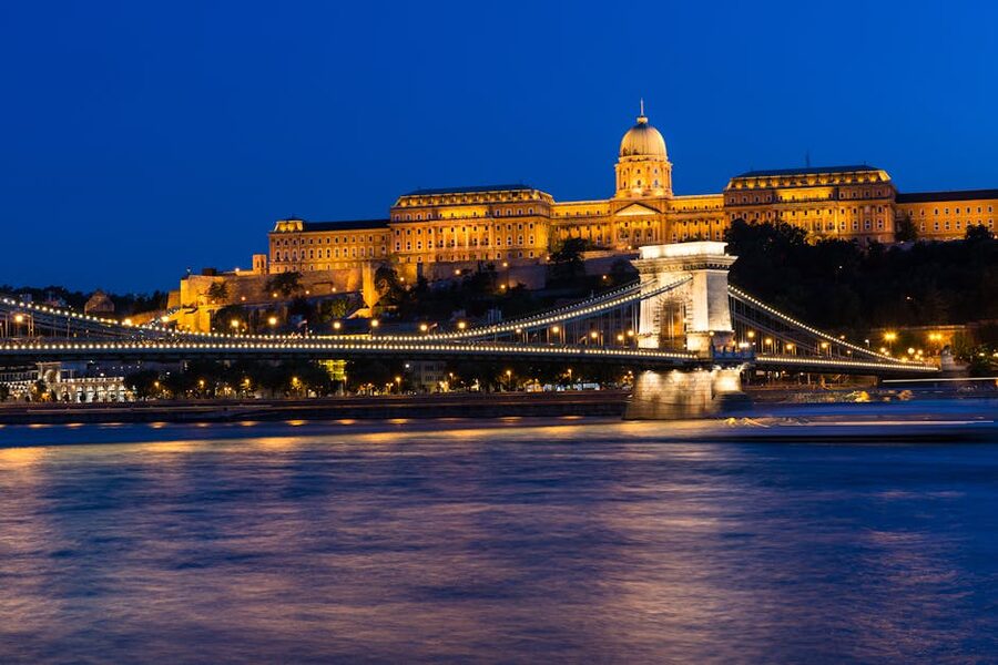 Buda Castle and Chain Bridge illuminated at night, Budapest