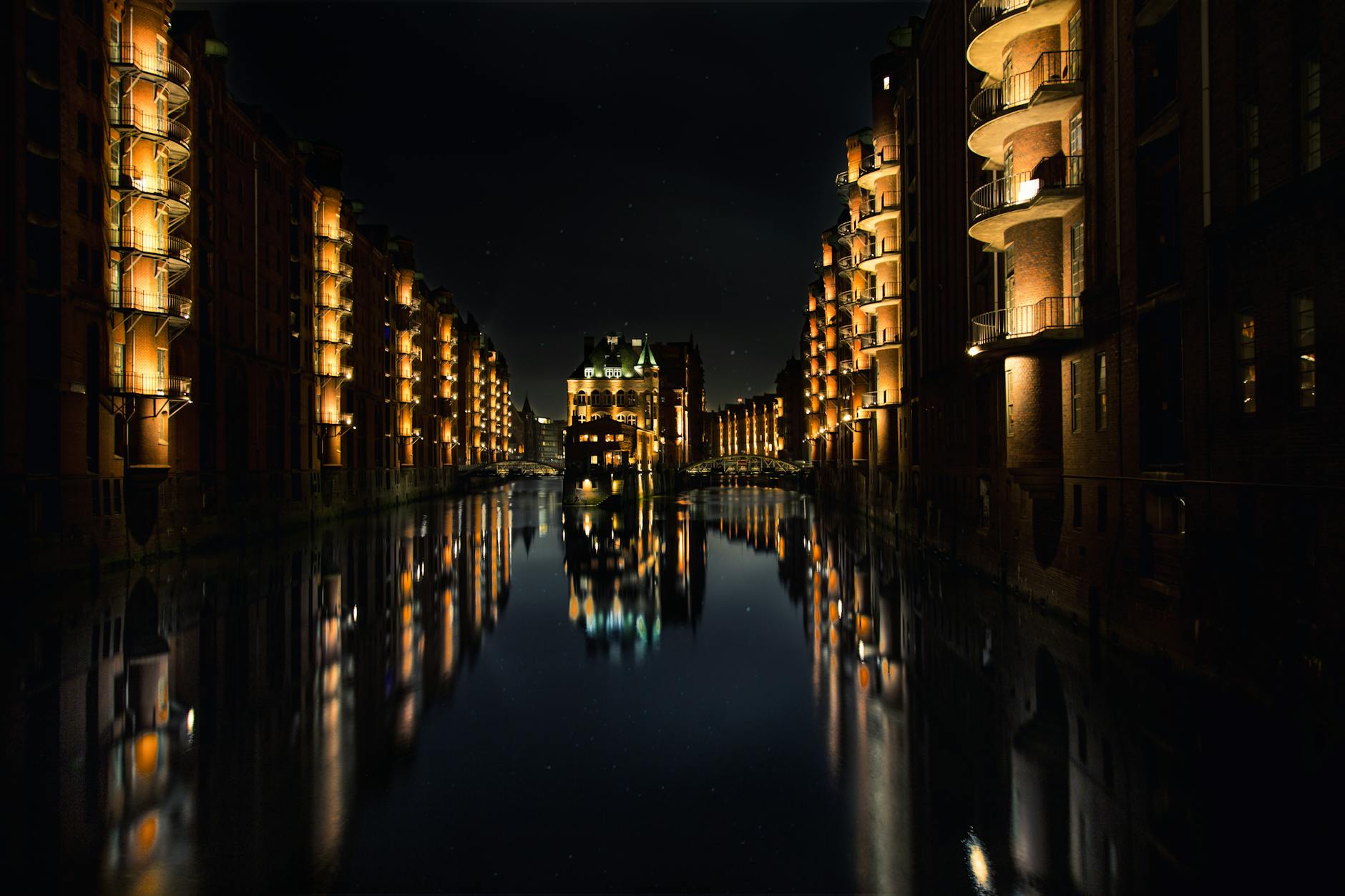 Illuminated Speicherstadt warehouse district in Hamburg at night