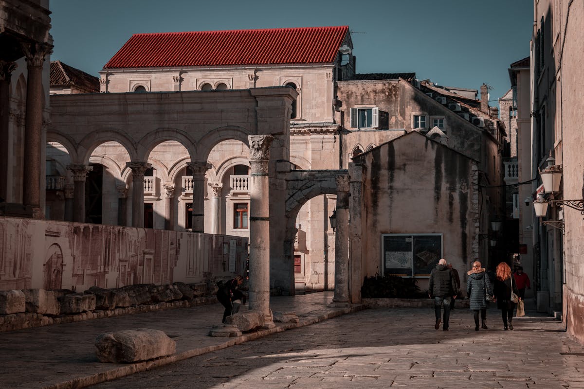 People walking through Split's historic centre
