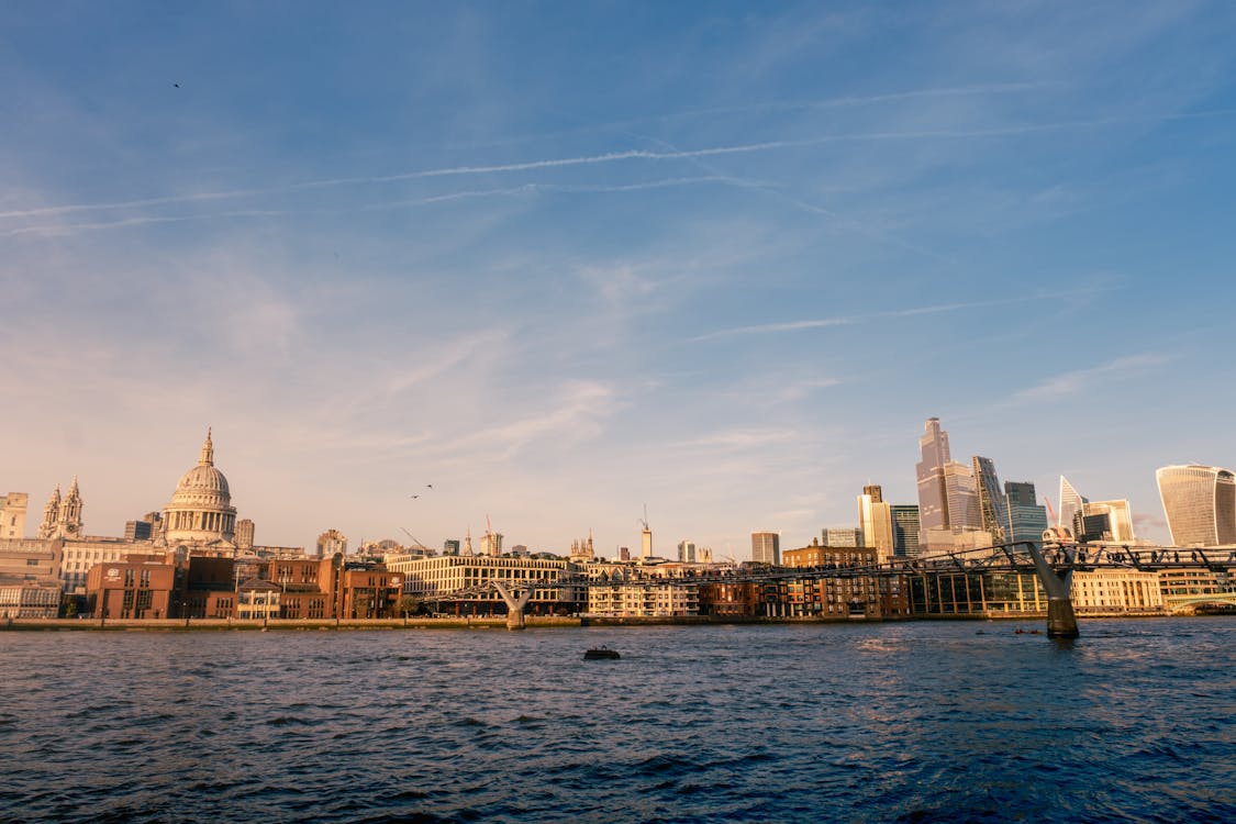 St Pauls Cathedral dome and the Millennium Bridge at sunset in London