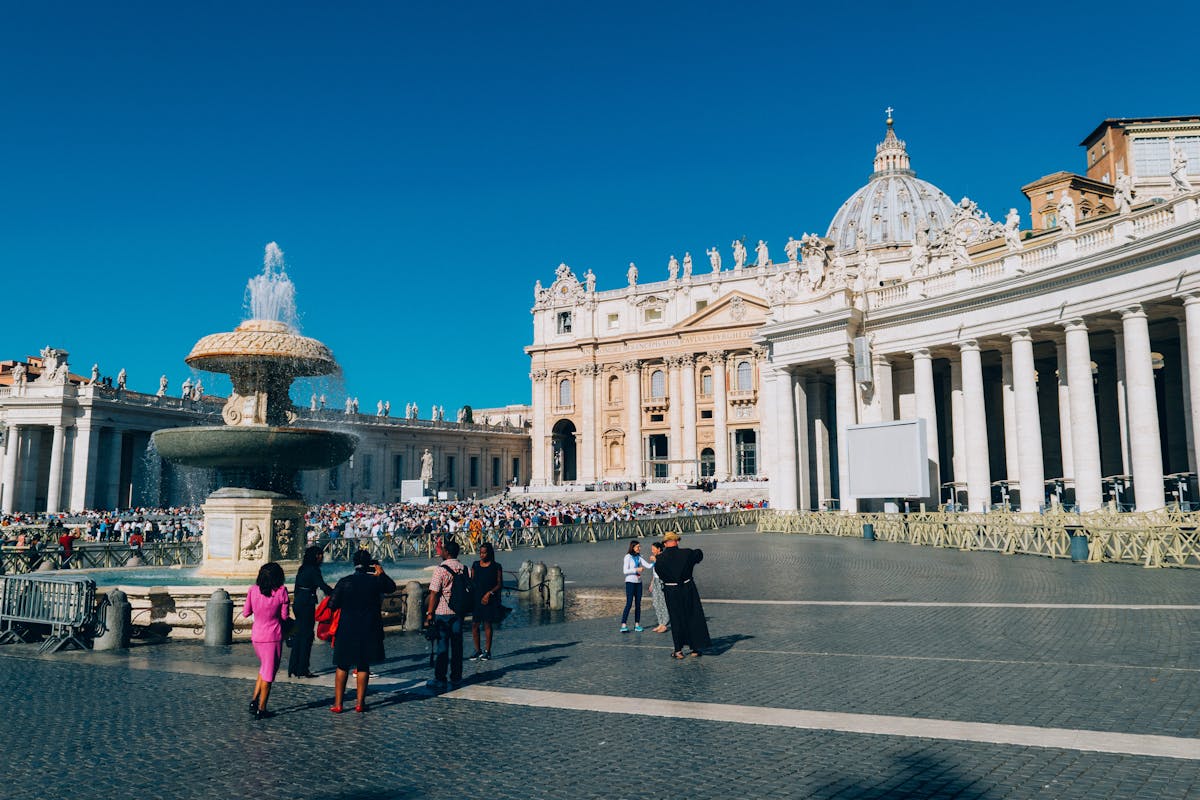 St Peters Square fountain with Vatican basilica dome in the background