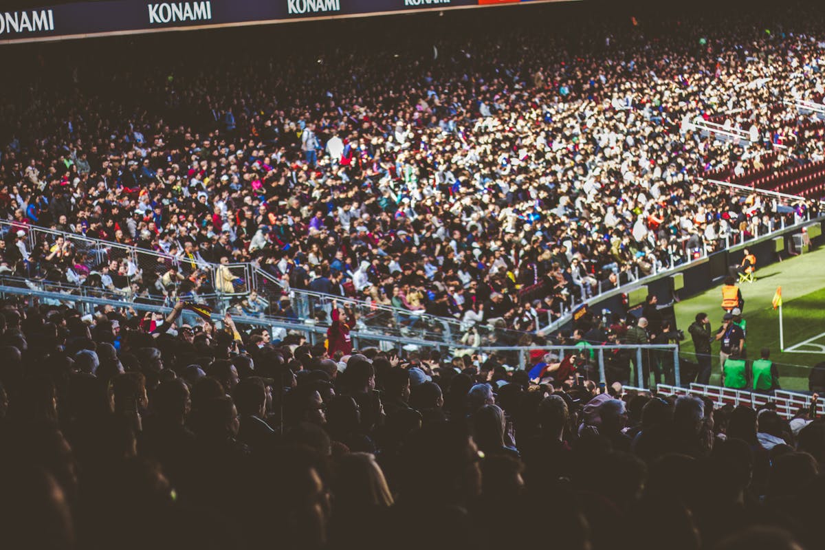 Crowded football stadium packed with fans during a match