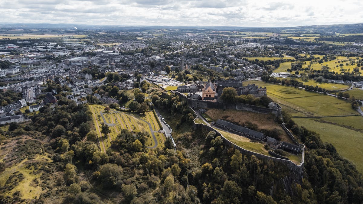 Aerial view of Stirling Castle surrounded by greenery