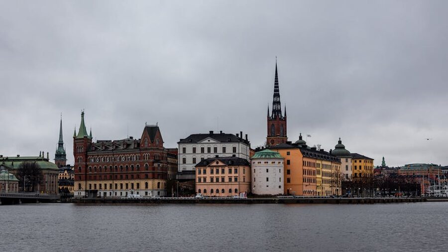 Stockholm cityscape with church spire across the water