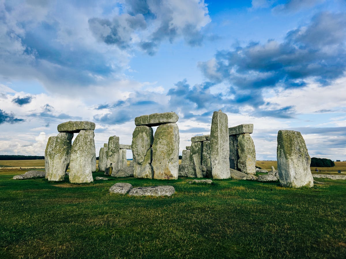 Scenic view of megalithic stones at Stonehenge in England with dramatic sky