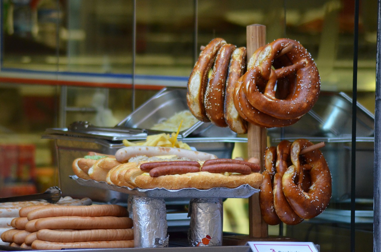 Traditional Strasbourg pretzels and sausages on display