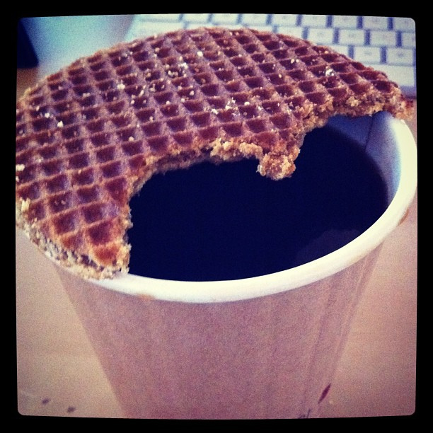 Stroopwafel on coffee cup warming