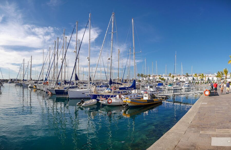 Puerto de Mogan harbour with boats and colourful buildings in Gran Canaria