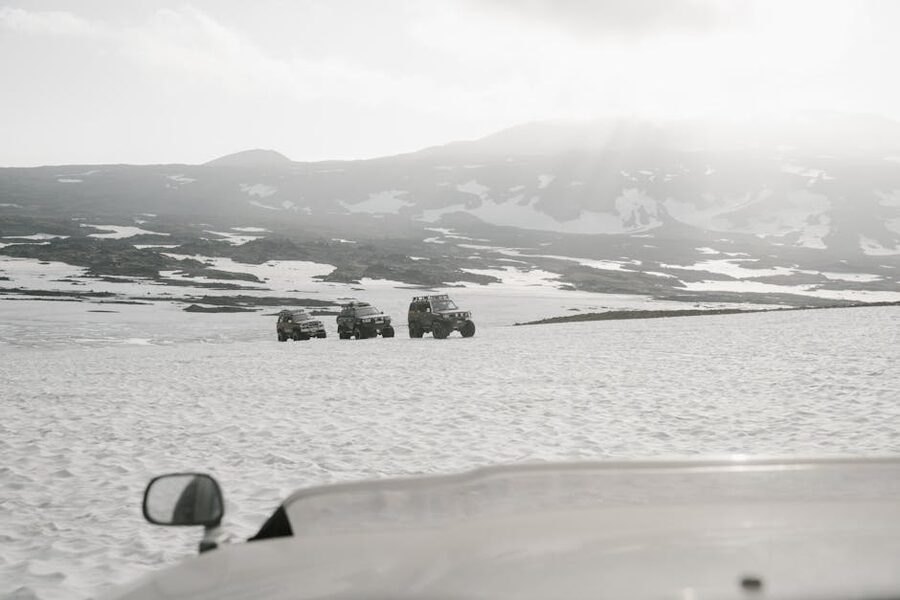 Super jeeps on snowy mountain terrain Iceland