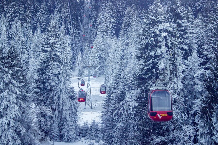 Cable cars in snowy Swiss Alpine winter