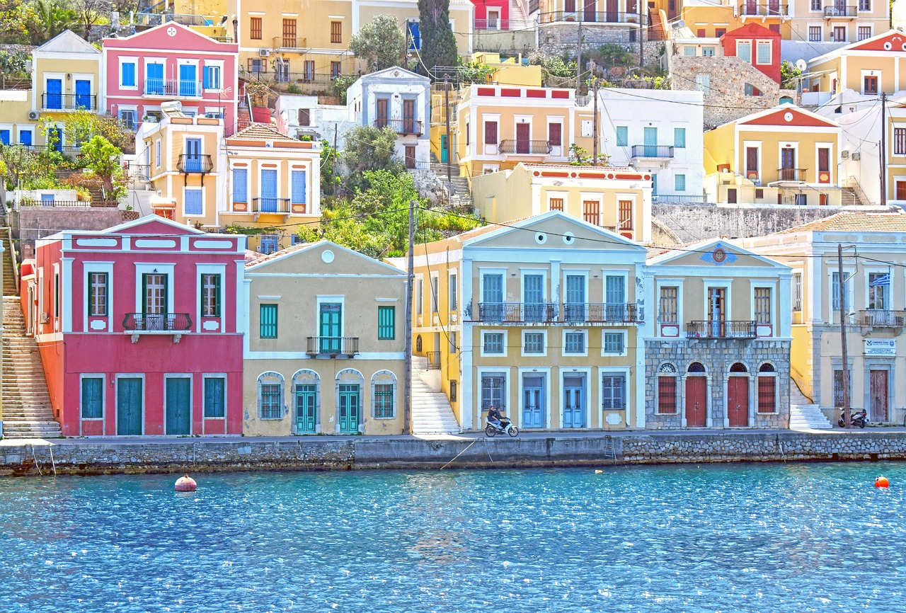 Colourful neoclassical houses around Symi harbour