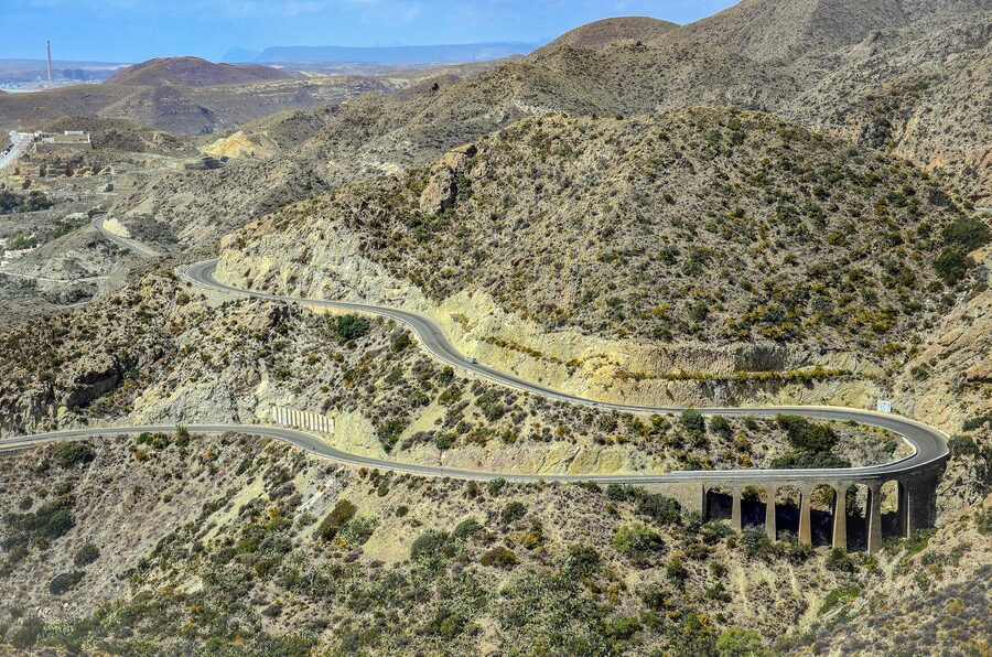Winding road through the arid hills of the Tabernas Desert region