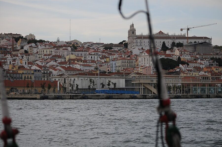 Tagus night cruise with lit 25 de Abril Bridge