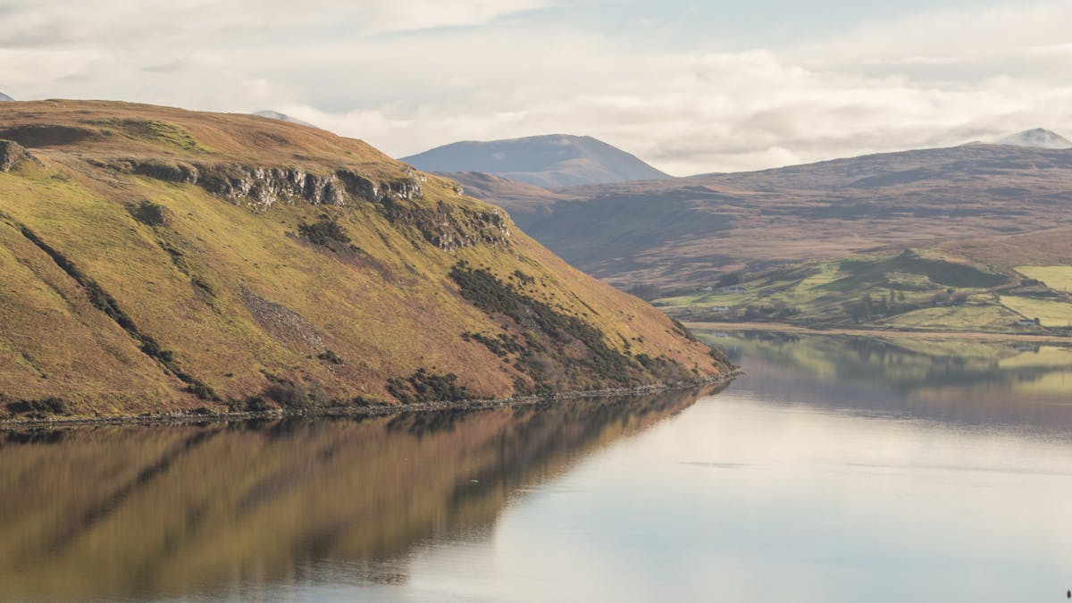 Talisker Bay on the Isle of Skye with reflections and rolling hills