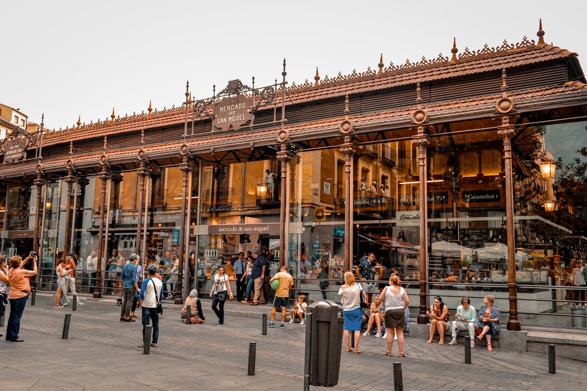 Inside the Mercado de San Miguel market in Madrid with food stalls and visitors