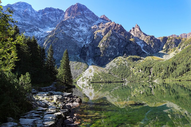 Mountain lake surrounded by forest in the Tatra Mountains, Poland