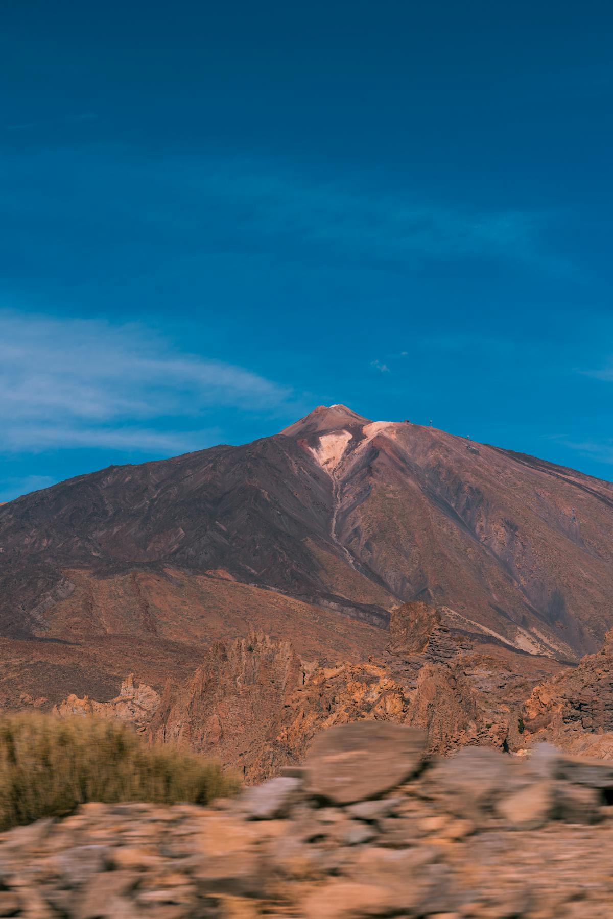 Wide view of Mount Teide on a clear sunny day showcasing the full volcanic landscape of Tenerife