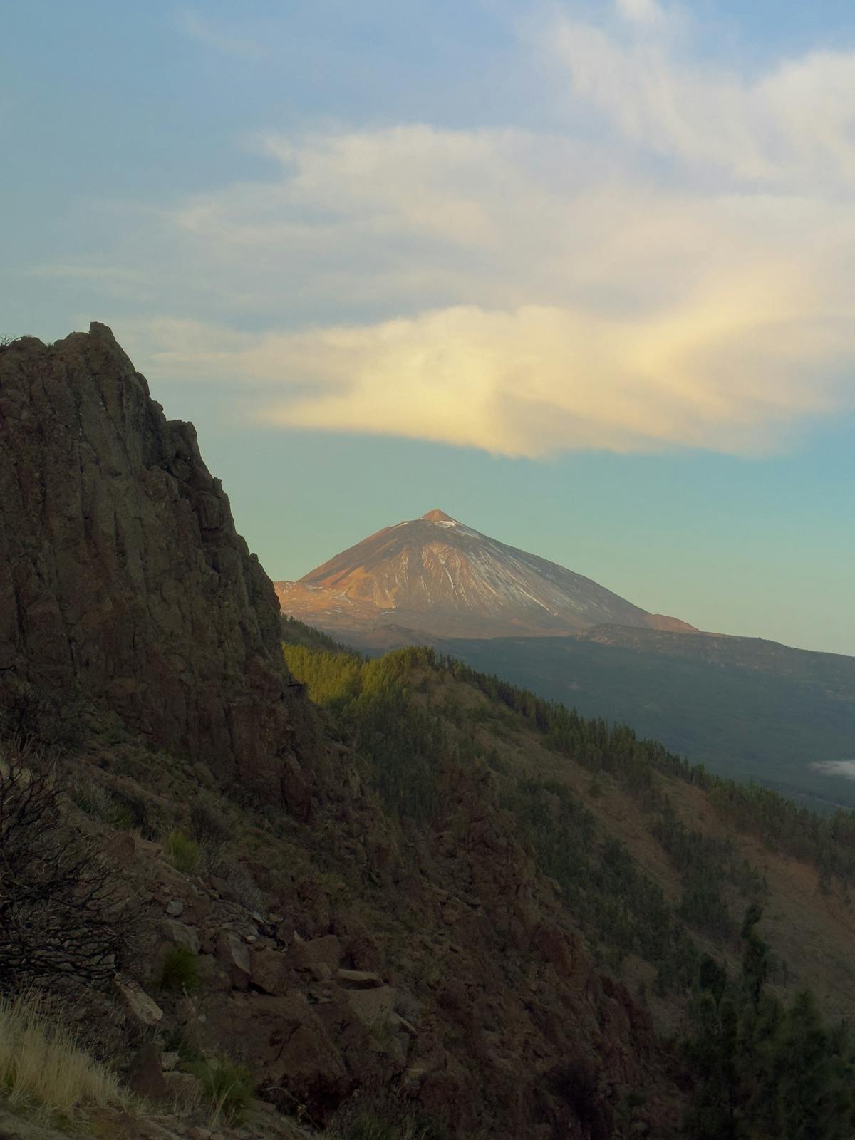 Captivating sunset view from Mount Teide with golden light over the volcanic landscape of Tenerife