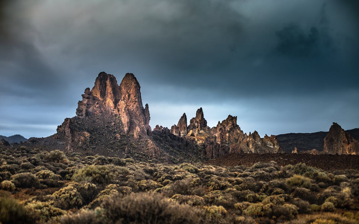 Dramatic rock formations under moody clouds in Teide National Park Tenerife