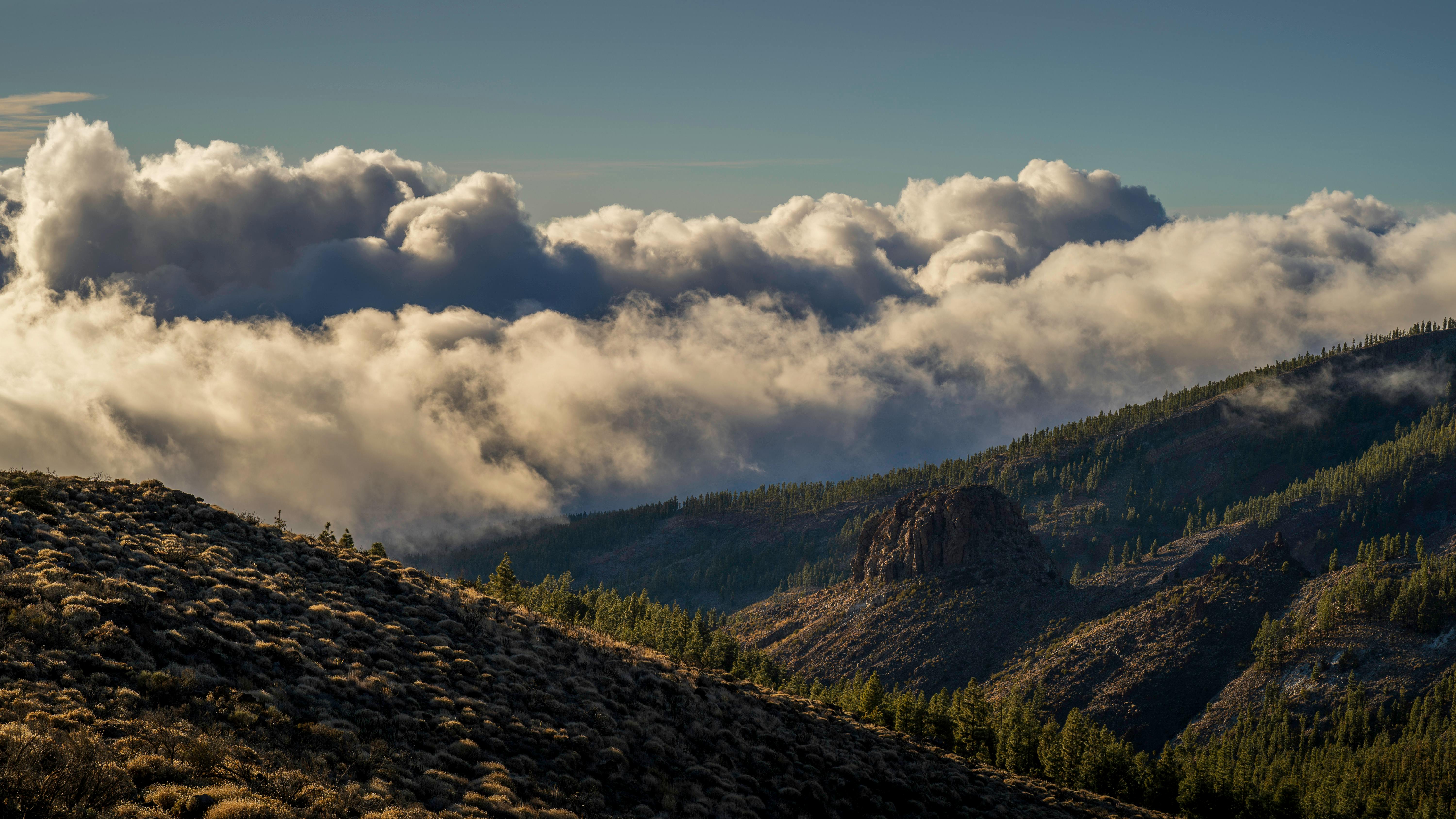 Mountain landscape with clouds above Tenerife showing volcanic terrain