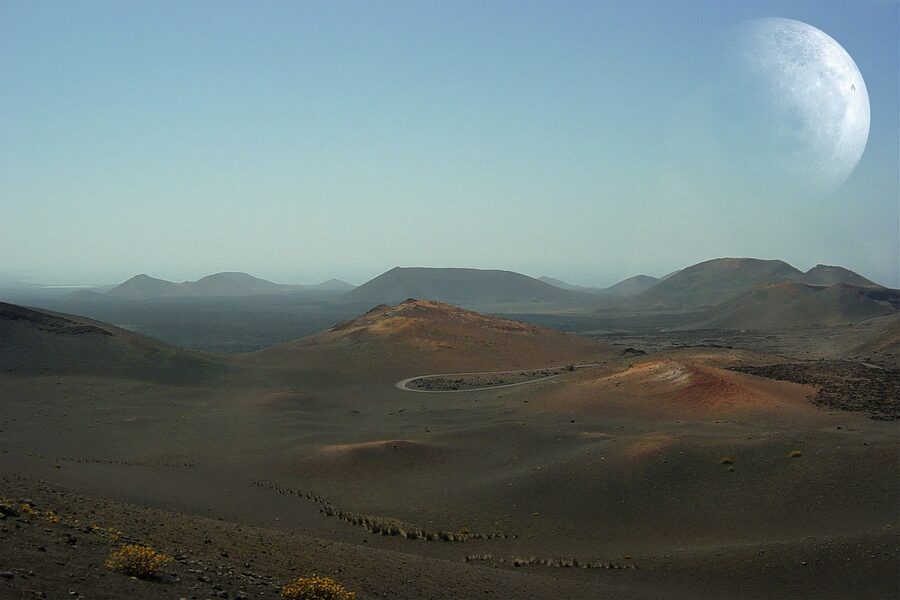 Moon-like volcanic landscape with craters in Timanfaya Lanzarote