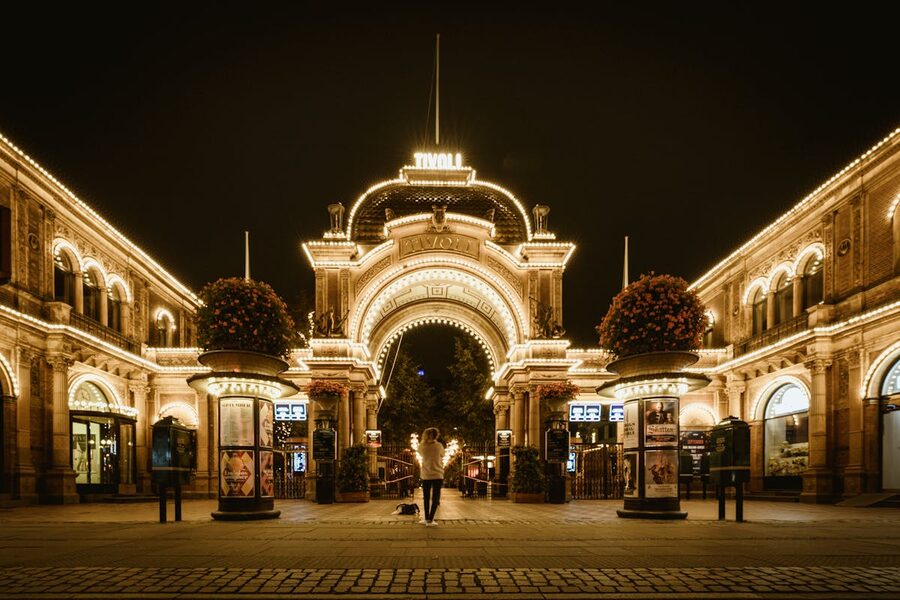 Tivoli Gardens Copenhagen during the daytime with attractions and visitors