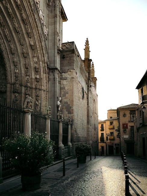 Detailed stone architecture and carved doorways in Toledo's historic district