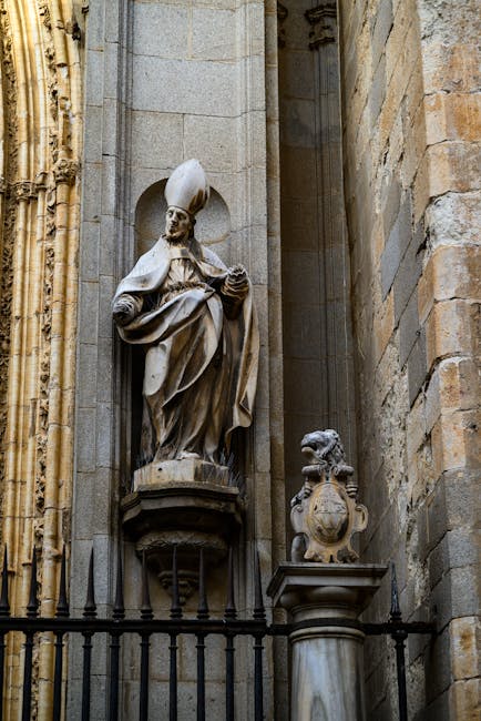 A historic monastery in Toledo with ornate stone carvings and a peaceful courtyard
