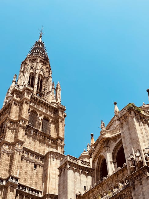 Wide panoramic view of Toledo showing the full city spread across its hilltop