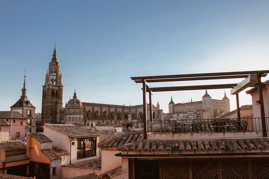 Panoramic view of Toledo perched above the Tagus River with its medieval walls and spires