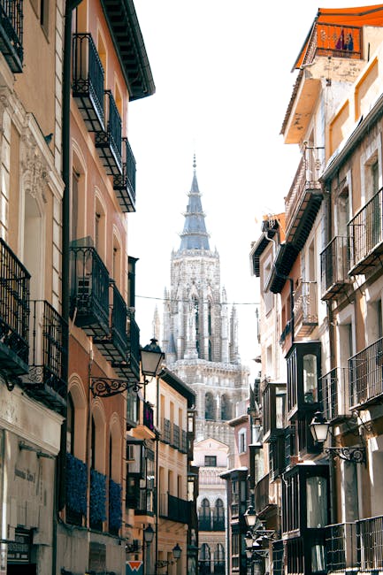The medieval skyline of Toledo rising above the Tagus River at golden hour