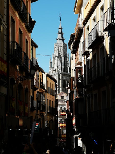 Toledo at sunset with warm golden light washing over the medieval buildings