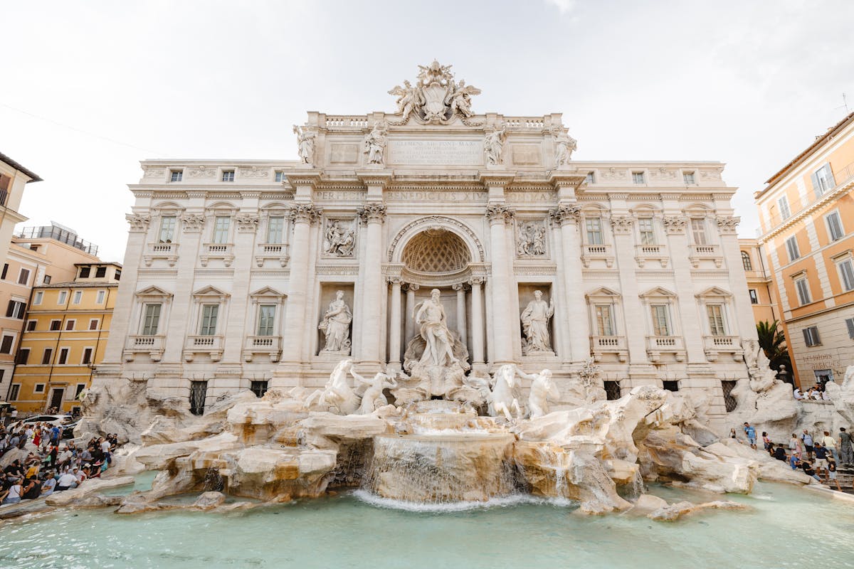 Trevi Fountain on a sunny day in Rome with clear blue sky