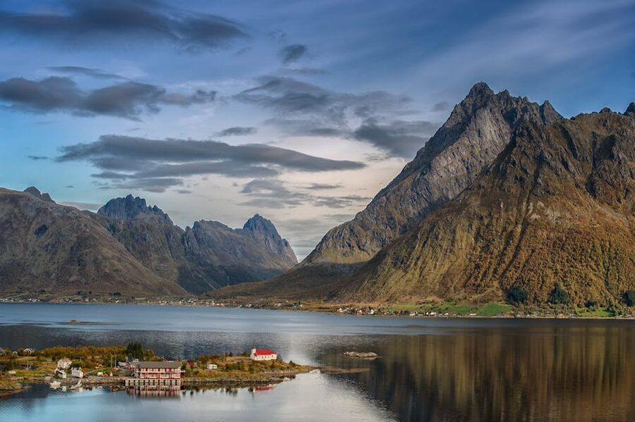 Lofoten coastal mountains and beach at sunset