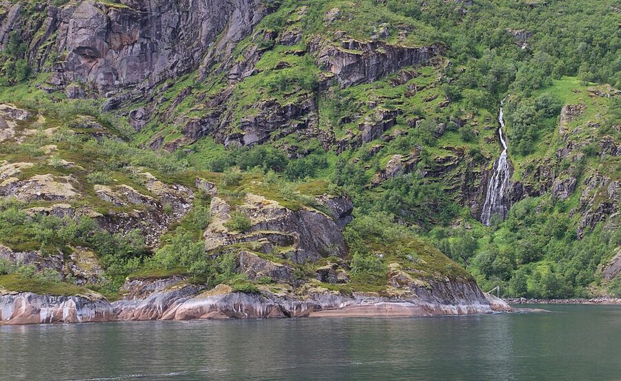 Narrow passage into Trollfjord with sheer rock walls on both sides