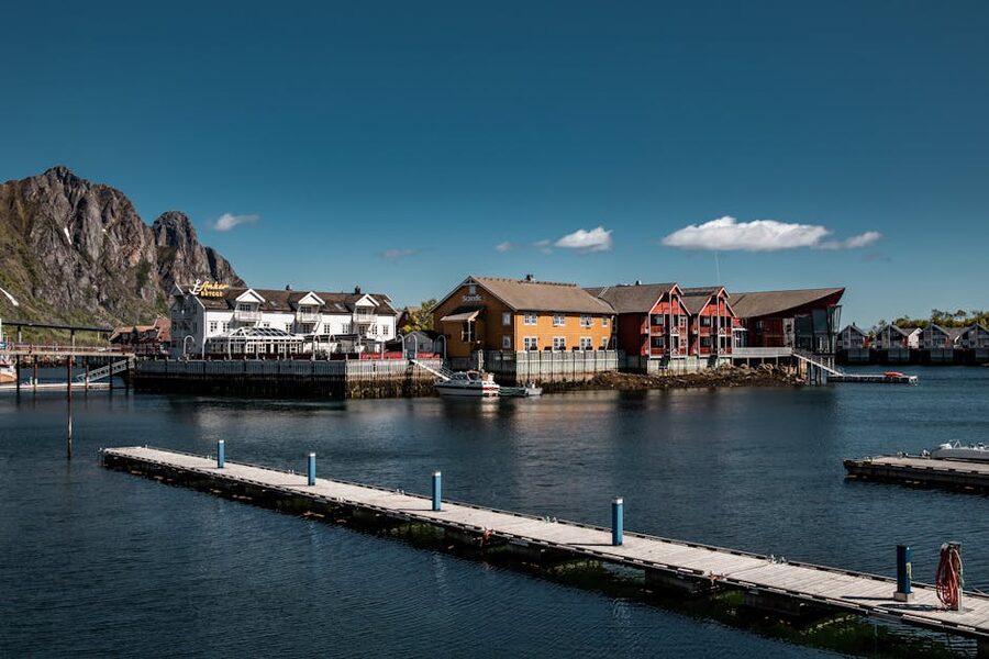 Svolvær harbor in Lofoten with colourful buildings and mountain backdrop