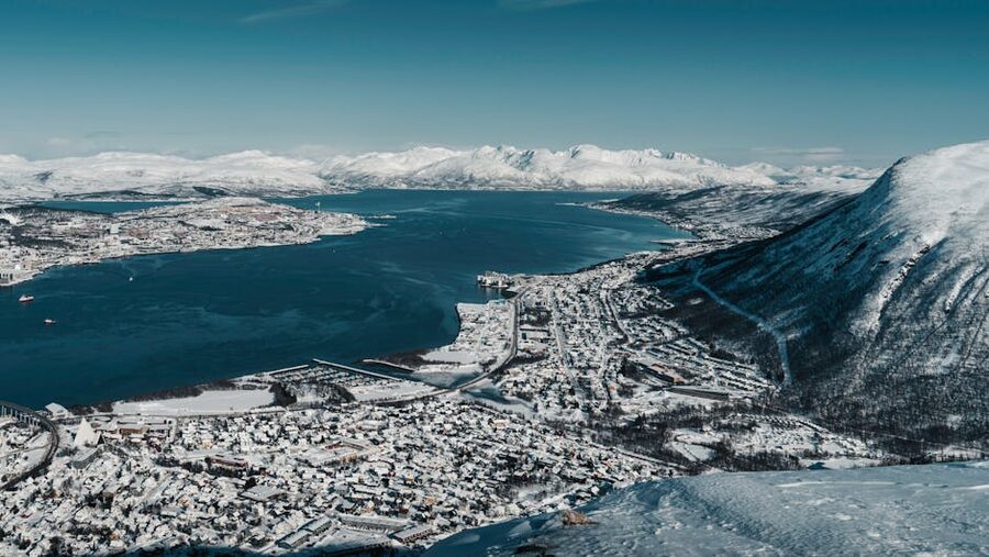 Aerial view of Tromso cityscape and fjord in winter