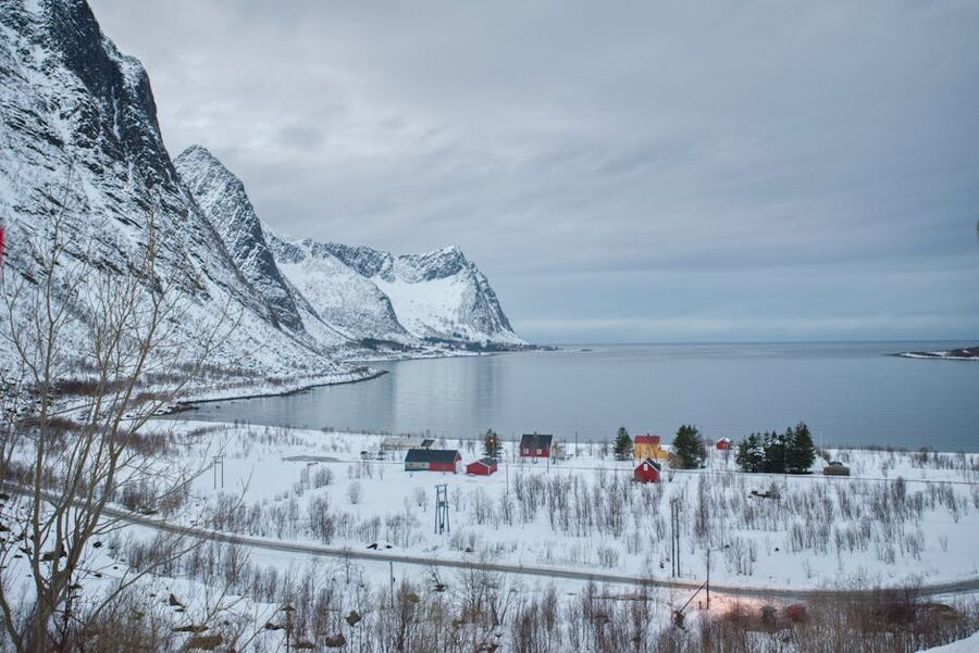 Tromso winter fjord with snow-covered mountains