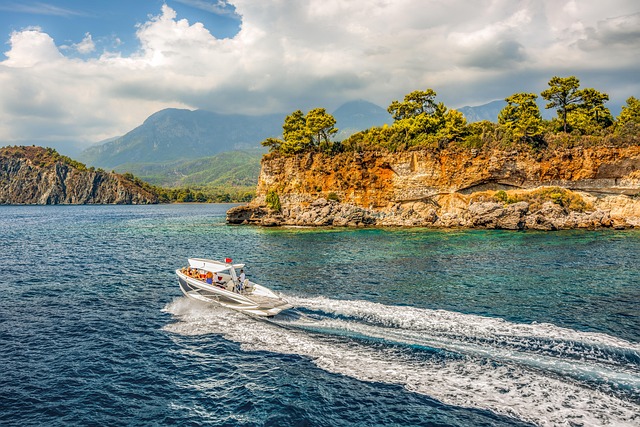 Boat moored along the Turkish Mediterranean coast with mountains in the background
