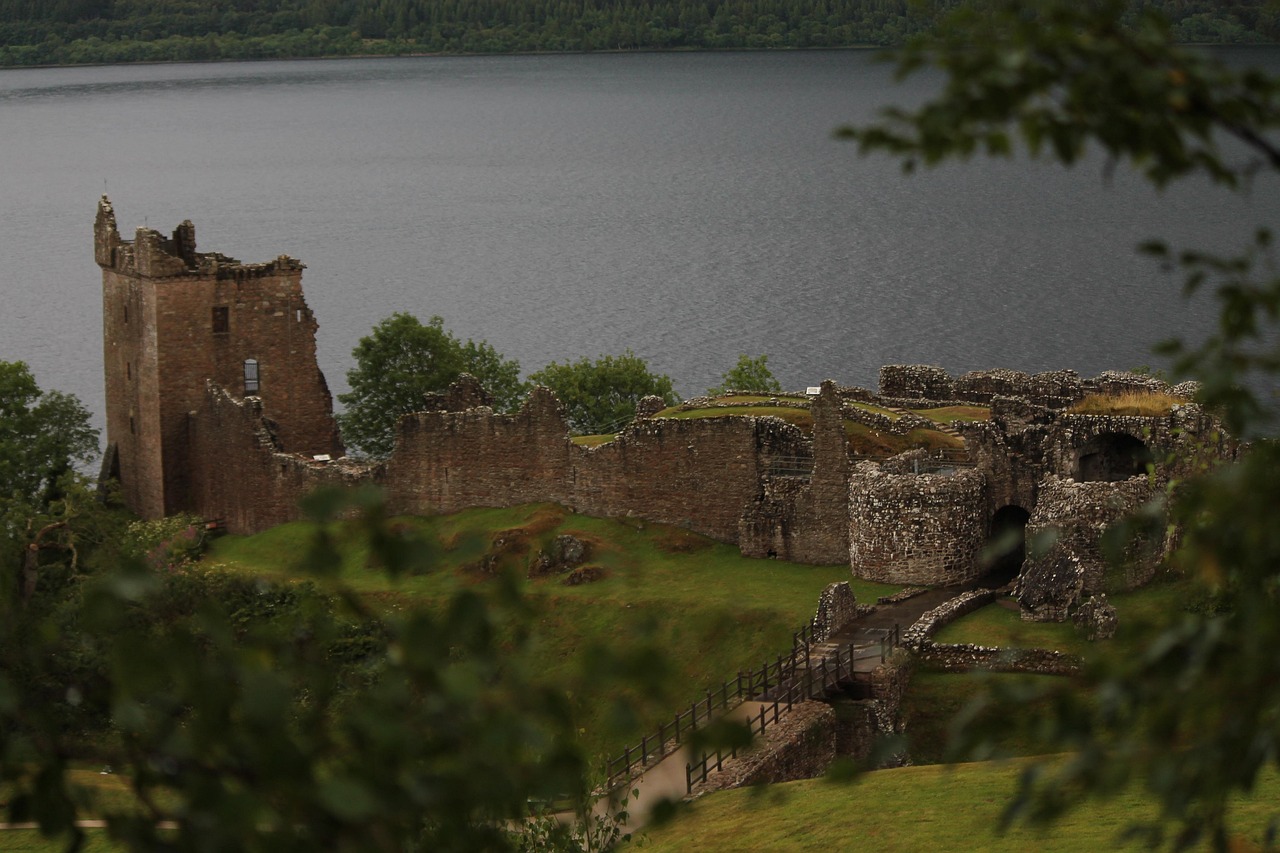 Urquhart Castle perched on a promontory overlooking Loch Ness