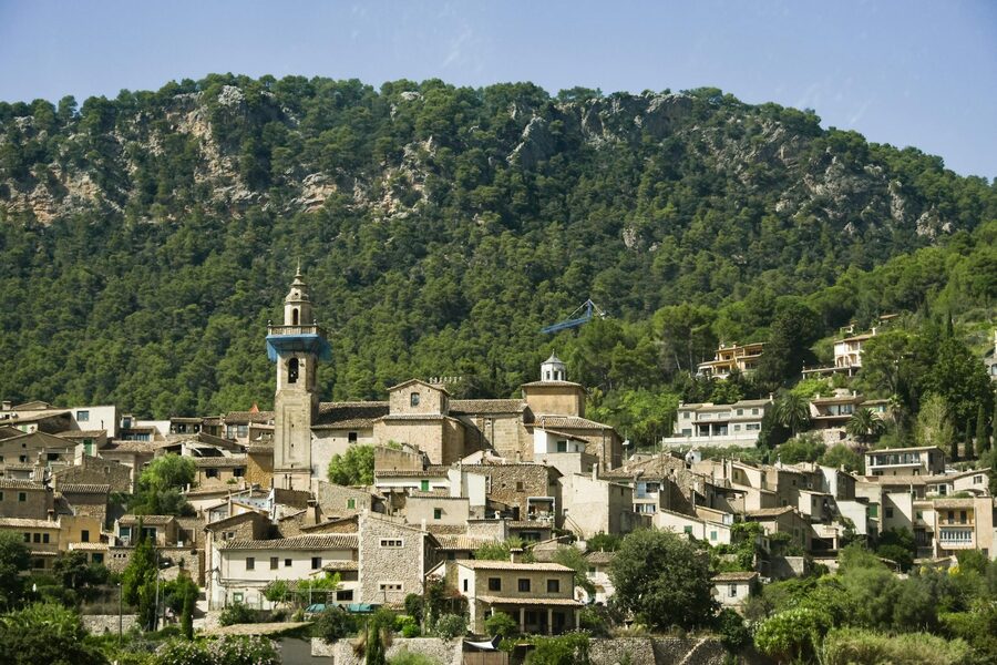 Valldemossa village set against the Tramuntana mountains in Mallorca