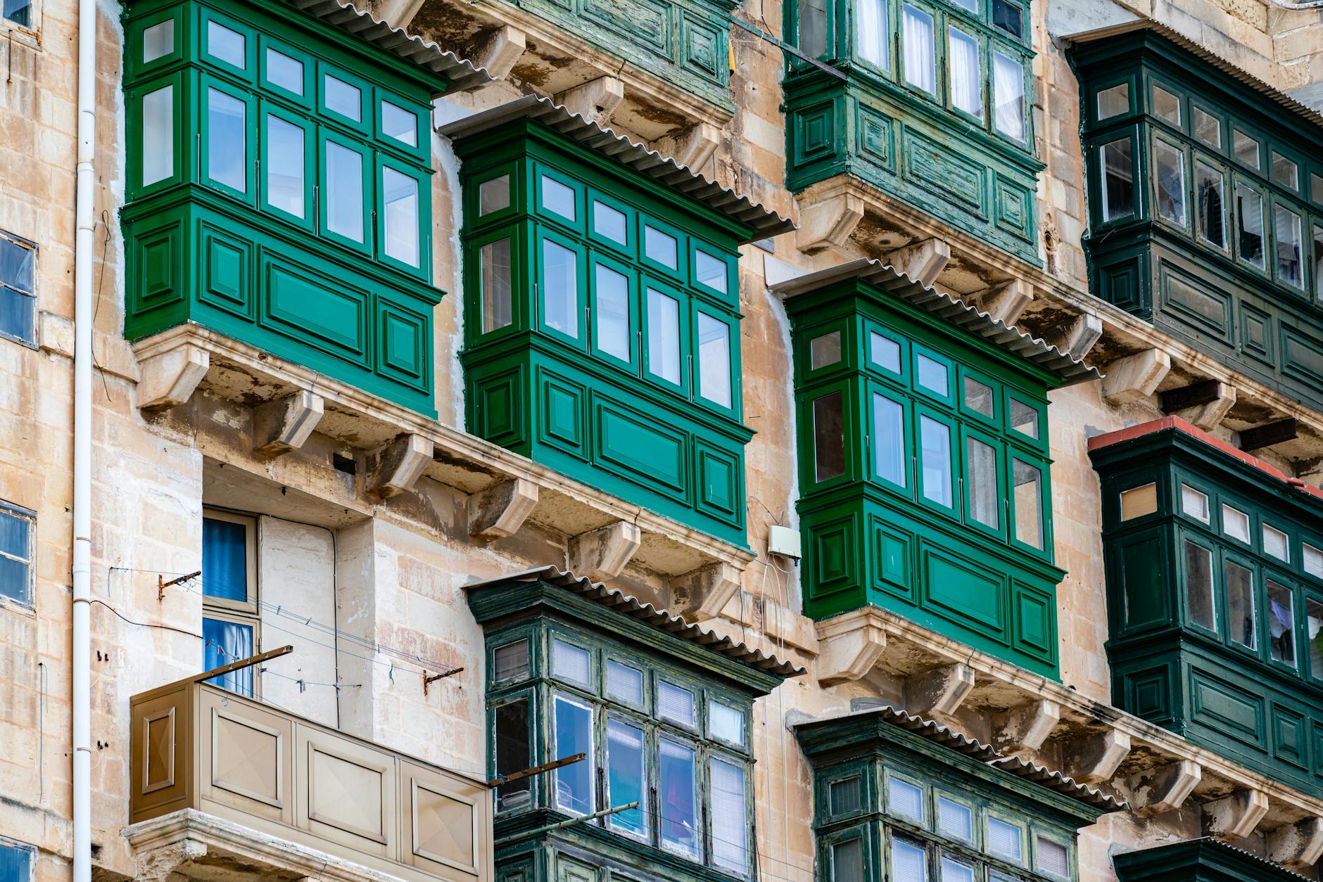 Colourful traditional wooden Maltese balconies close-up in Valletta