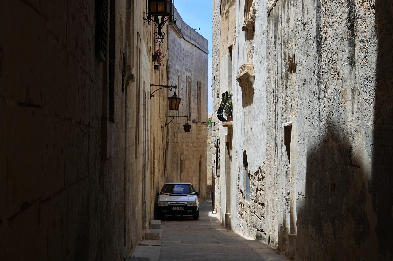Valletta street architecture with limestone buildings