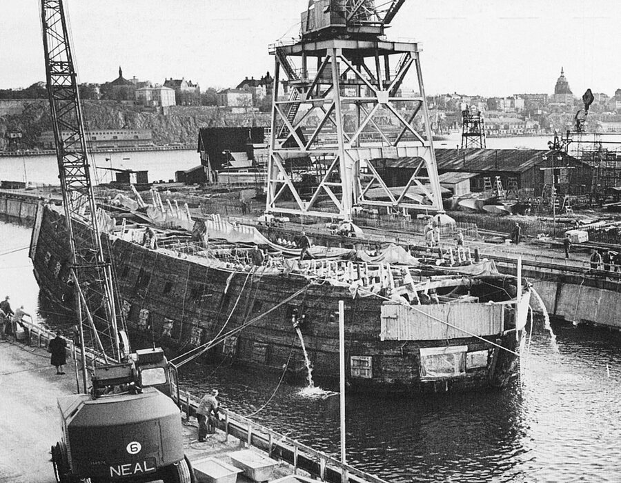The Vasa ship breaking the surface of Stockholm harbour during salvage in 1961