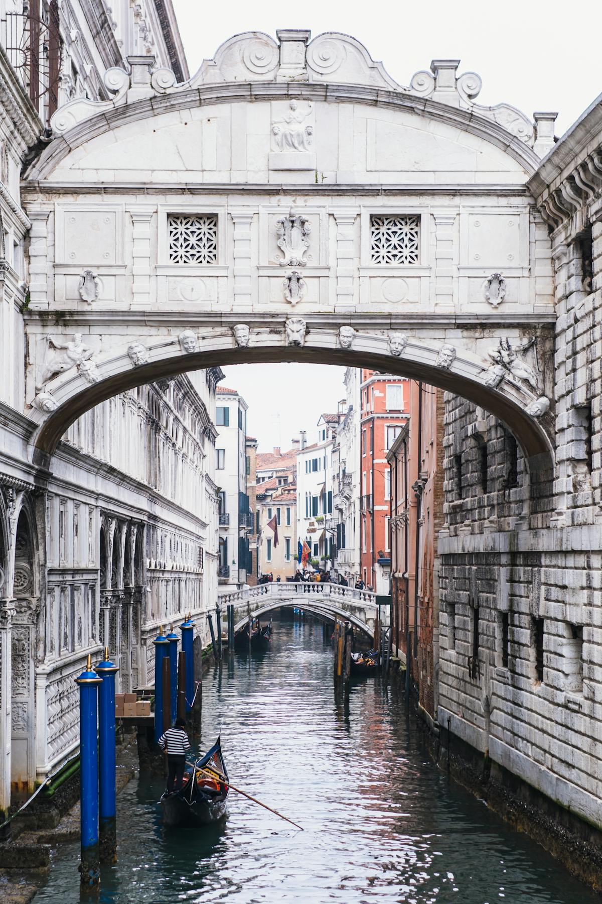 The Bridge of Sighs arching over a Venice canal
